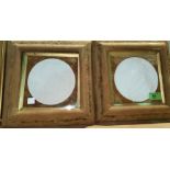 A circular pair of relief plaques depicting classical scenes, framed and glazed; a small watercolour