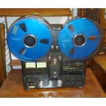 A Technics 4 track 1506 reel to reel recorder, with a good selection of Maxwell and other reels