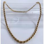 A yellow metal rope twist chain necklace, stamped 750 hallmarked gold, 12.6gms.