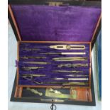 A set of drawing instruments, 19th century, in brass inlaid case with key, 24 x 16cm