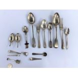 Two hallmarked silver fiddle pattern dessert spoons; a selection of miscellaneous hallmarked
