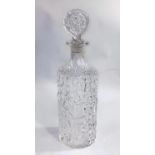 Geoffrey Baxter for Whitefriars, a cylindrical clear glass "bark" decanter with a tab stopper.