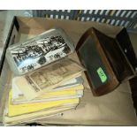 A pair of antique walnut cased stereocard viewers and a selection of cards