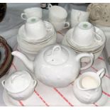 A Mintons Victoria Strawberry eight setting tea service with teapot, milk jug, sugar, cups and
