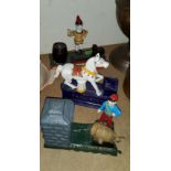 Three cast metal novelty money boxes 'Trick Dog', 'Artillery Bank' and 'Trick Pony'