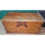 A 19th century style chest of small stature with decorative inlay to the front, hinged lid