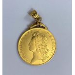 GB: a George III Two Guinea coin, 1738 with gold jewellery mount