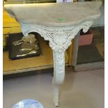 A Victorian style side table with cream composite marble type finish