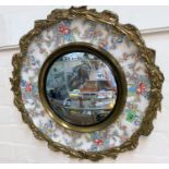 An Artmaster Staffordshire ceramic mirror plaque with brass reef style surround with convex
