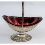 A hallmarked silver classical style pedestal bowl with extensive pierced and beaded decoration,