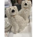 A large pair of Staffordshire pottery hearth Spaniels, 36cm