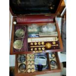 A mahogany medical case containing hydrometer, scales, agate mortar, Pharmacoepia etc, the box
