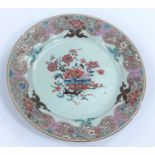 A 19th century Chinese famille rose plated decorated with flowers etc, d. 22.5cm