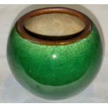 A small globular Chinese monochrome crackle glaze squat globular vase the rim unglazed, height 6.5cm