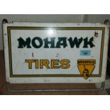 A Mohawk Tyres advertising sign designed to attach to a tyre