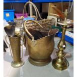 A brass coal helmet and companion set; a large brass table lamp; a log basket; etc.