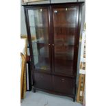 A Stag display cabinet with double glazed doors above and double doors below height 181, width 95cm