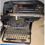 An early 20th century office typewriter;