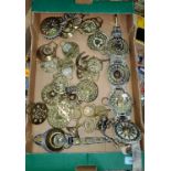 A selection of horse brasses etc on leather martingale and others loose; a signed limited edition