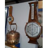 An oak cased aneroid barometer; a 400 day clock; etc.