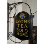 A LYONS TEA enamelled sign on original wrought iron bracket