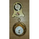A Louis XVI style ormolu cartel / wall clock with relief decoration and floral porcelain dial and