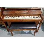 A modern small walnut cased piano, iron framed and overstrung, by Schwander, with duet stool