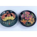 Two Moorcroft pin dishes, one centenery dish 1897-1997, 12cm and another marked MCC 2003, diamter