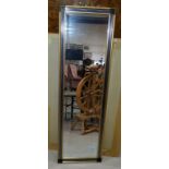 A modern gilt and silvered rectangular bevelled edge wall mirror 128 x 38cm