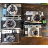 Two VOIGTLANDER camera and three others.