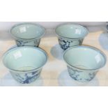 Four Chinese blue and white tea bowls with Prunus blossom decoration with birds, a character mark to