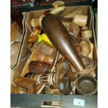 A large selection of carved treen items of all kinds, pots, candlesticks etc