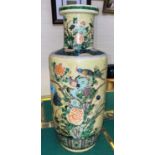 A large Chinese famille vert rouleau vase with yellow ground, decoration of birds on branches,
