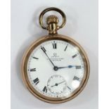 An Omega open faced keyless pocket watch in gold plated case