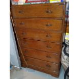 A 1930's oak tall chest of 6 drawers, height 111cm, depth 44cm, width 73cm