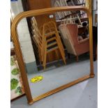 An overmantel mirror in Victorian style gilt frame; a rectangular wall mirror in cream frame