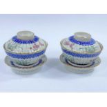 A pair of 19tth century Chinese lidded rice bowls with matching circular rest, of ribbed form with