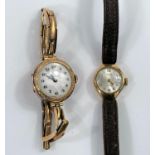 A ladies' 9 carat hallmarked gold wristwatch by Omega, on brown leather strap; an early 20th century