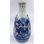 A 19th century Chinese vase of swelling bottle shaped form, decorated in underglaze blue with