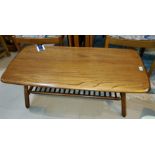 An Ercol coffee table with laddered undershelf of rounded rectangular form, length 103cm
