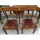A set of 6 Regency mahogany dining chairs with wide top rails, turned legs and brown dralon drop