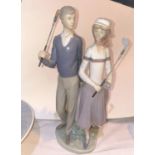 A Lladro group of 2 golfers