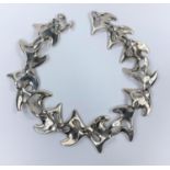Georg Jensen: a large silver 'amoeba' necklace designed by Henning Koppel, stamped 'Sterling