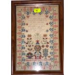 A needlework sampler by Elizabeth Morgan, 13, 1856, 38 x 25 cm, framed and glazed; a pencil