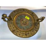 An unusual brass comport with renaissance style extensive relief decoration and colouring, scroll