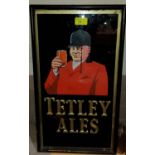 A glass framed sign for Tetley Ales, 49 x 26 cm
