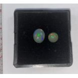 Two loose cabochon cut opals weighing 2.70cts