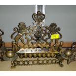 A late 19th early 20th century brass Hanukkah light -Menorah with twin side sconces, lions rampant