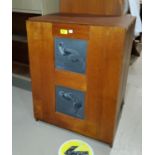 A 1960's teak record cabinet with slate tiles to the front decorated with animals