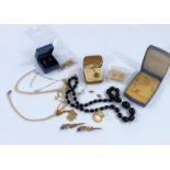 A selection of gold and gilt items of jewellery and items of designer jewellery